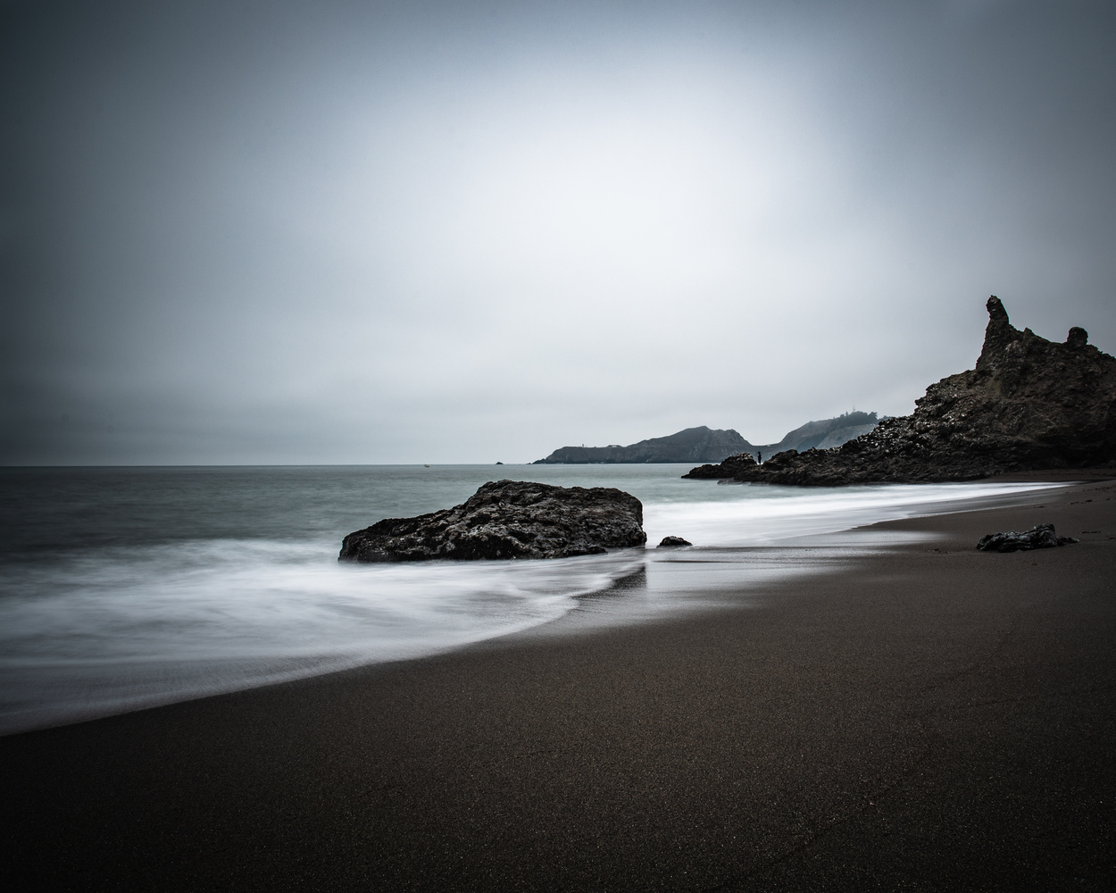 View Fog Over Black Sands Beach by Jason Stewart