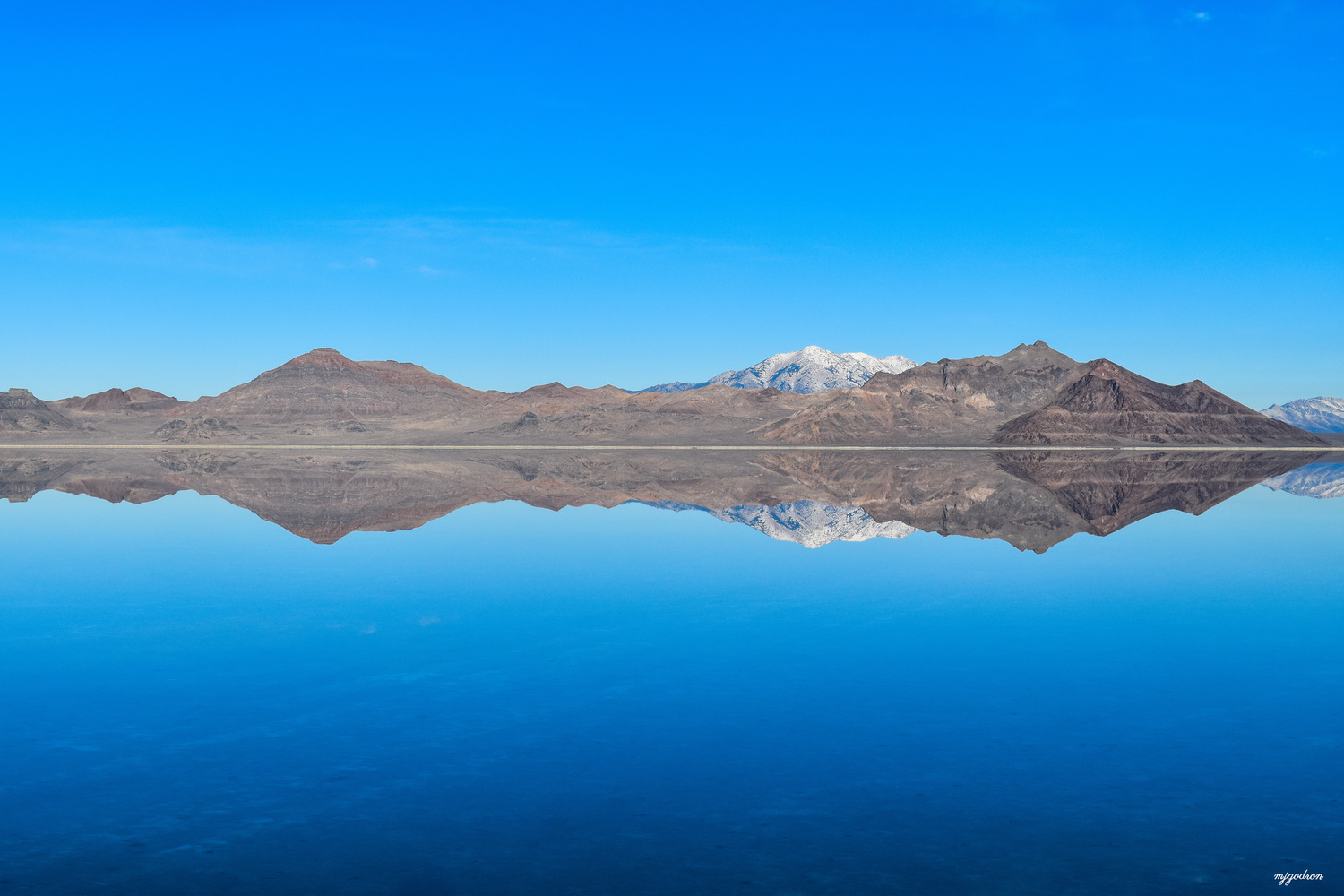 View Bonneville Salt Flats Mirror Image by Melissa Godron