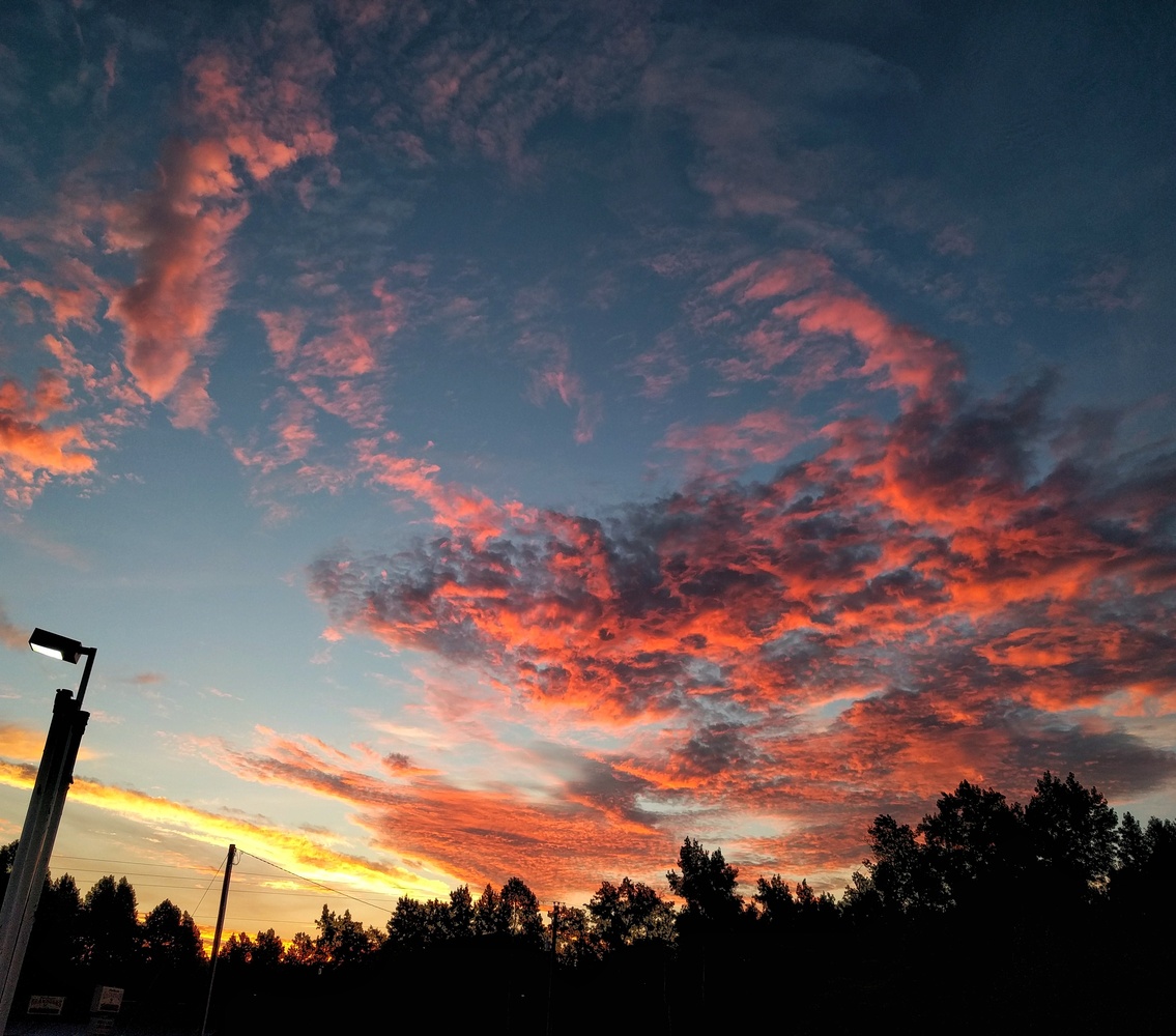View Early Morning Cloud Swirl by Ron DesGroseilliers Jr.