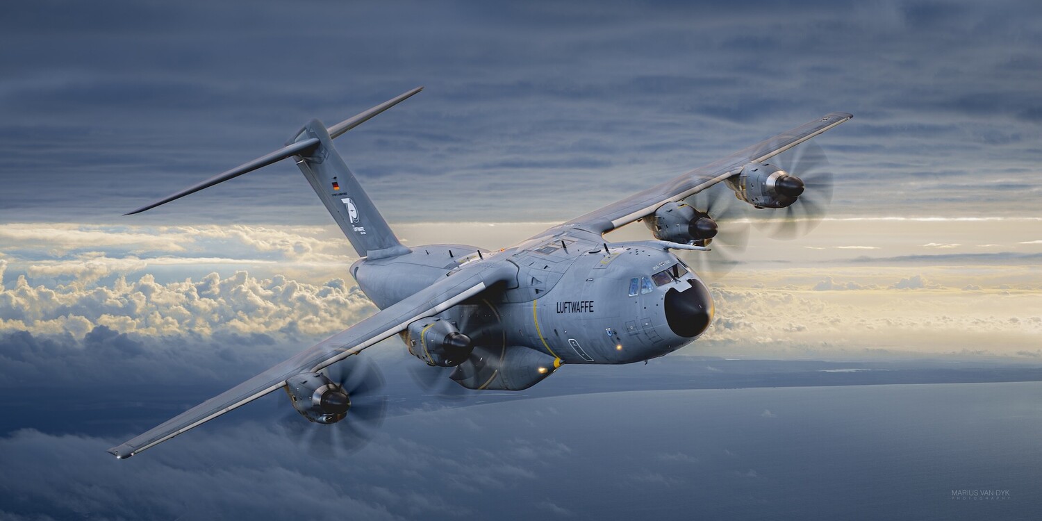 Illustration of a military transport aircraft in flight above clouds