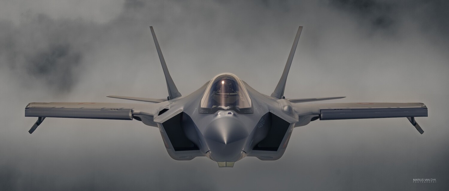 Illustration of a fighter jet aircraft viewed head-on against a cloudy sky