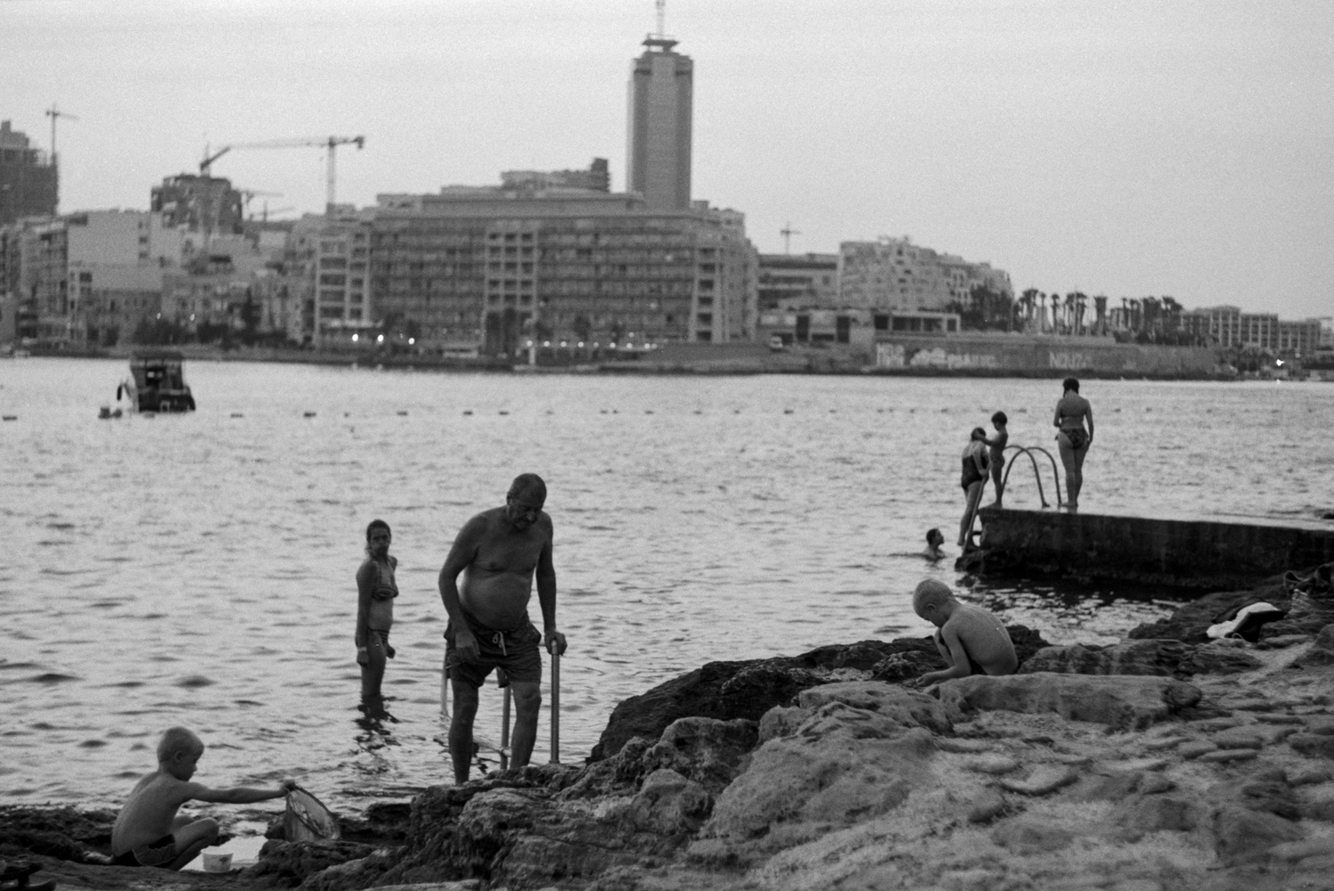 View A Late Afternoon Dip by Anthony Mizzi