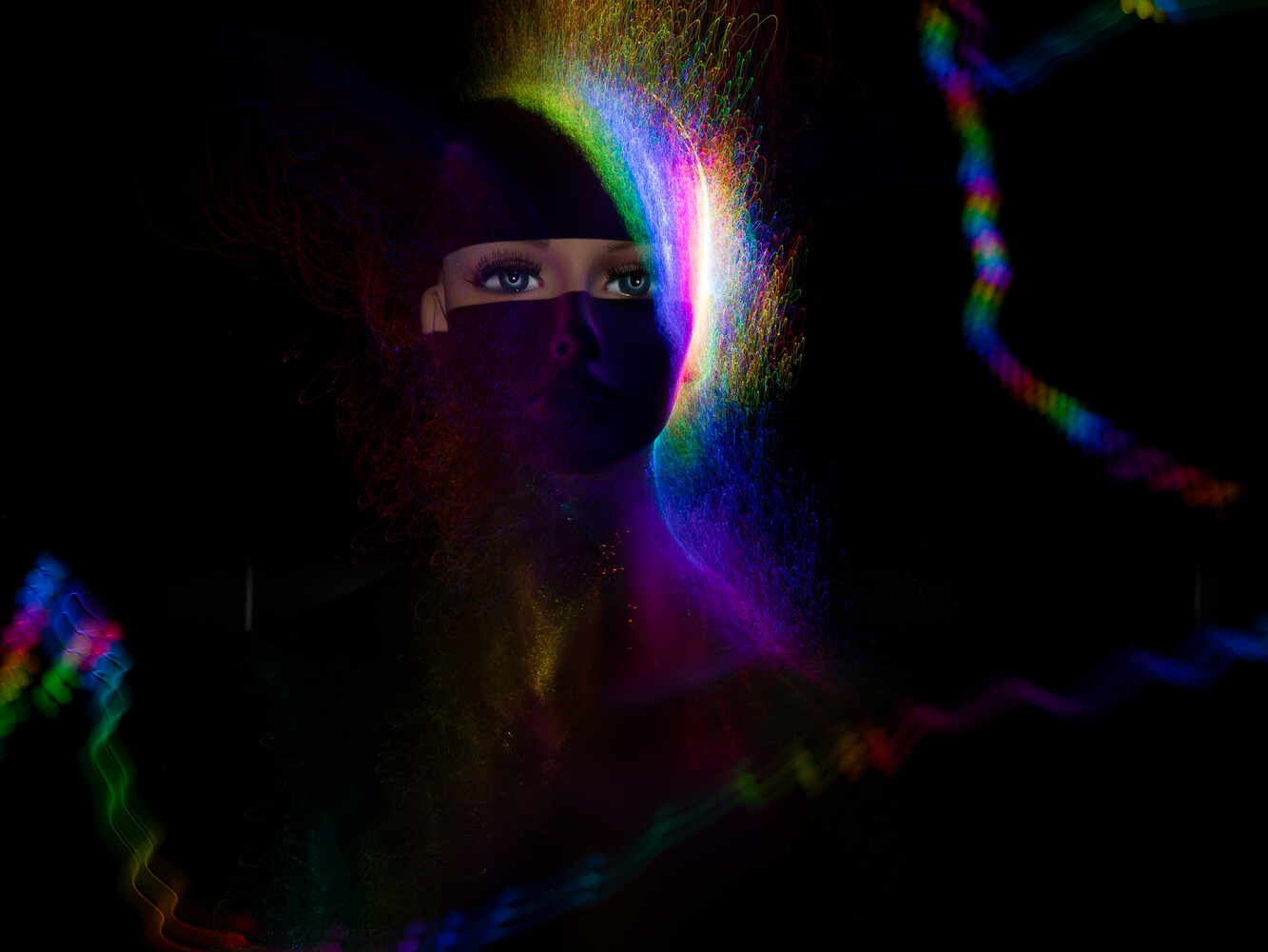 Person's face illuminated by vibrant rainbow light spectrum in dark environment
