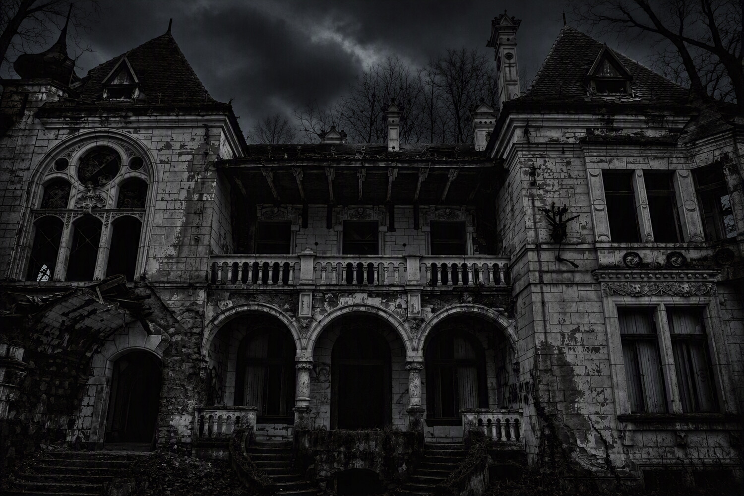 Abandoned mansion facade with ornate stone arches and balustrade under stormy sky