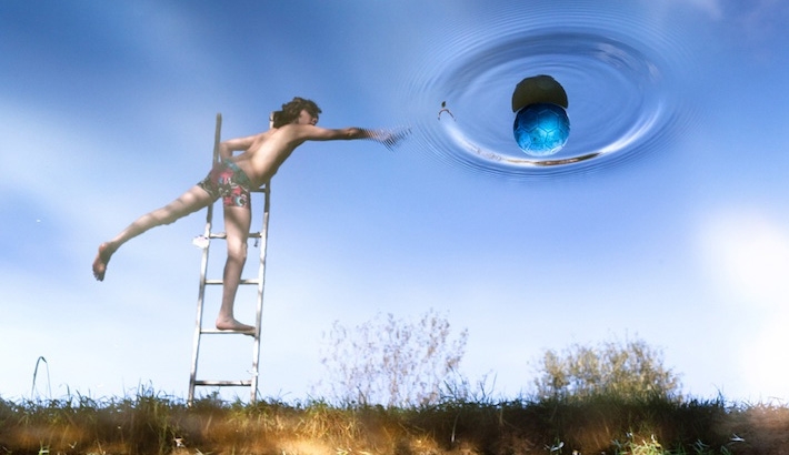 Father Photographs Children's Magical World Through Water Reflections