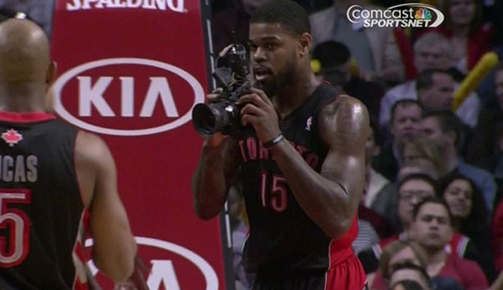 NBA Player Picks Up Photographer's DSLR and Snaps Away