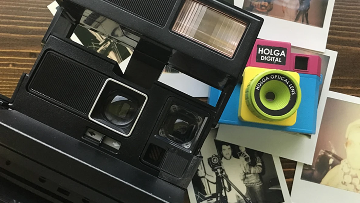 Watch Holga Digital Vs Polaroid 600 Review Comparison on YouTube.