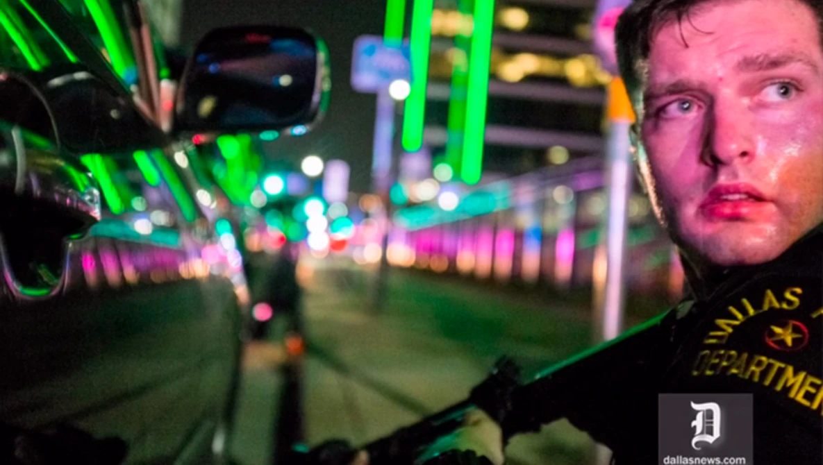 Watch Photographer describes being sheltered by Dallas police on YouTube.