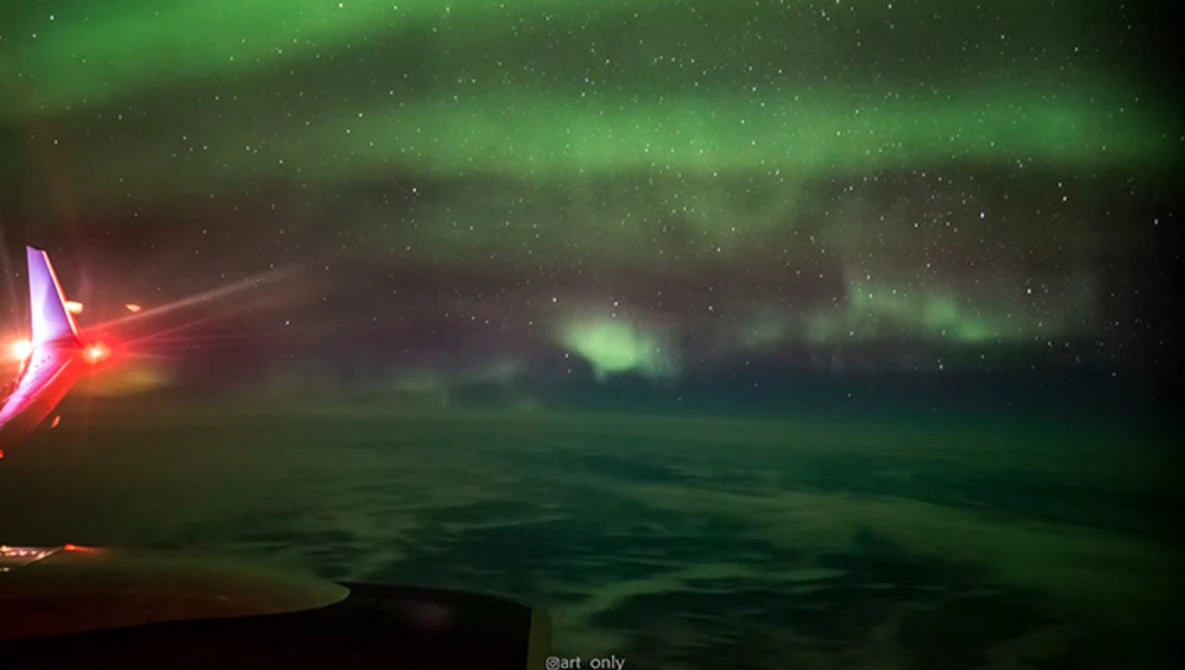 Watch The Northern Lights From My Window Seat at 35,000ft on YouTube.
