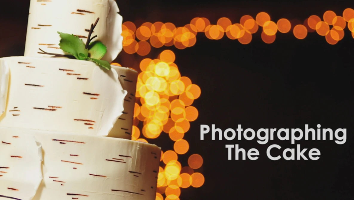 Watch How to Photograph a Wedding Cake at a Reception on YouTube.