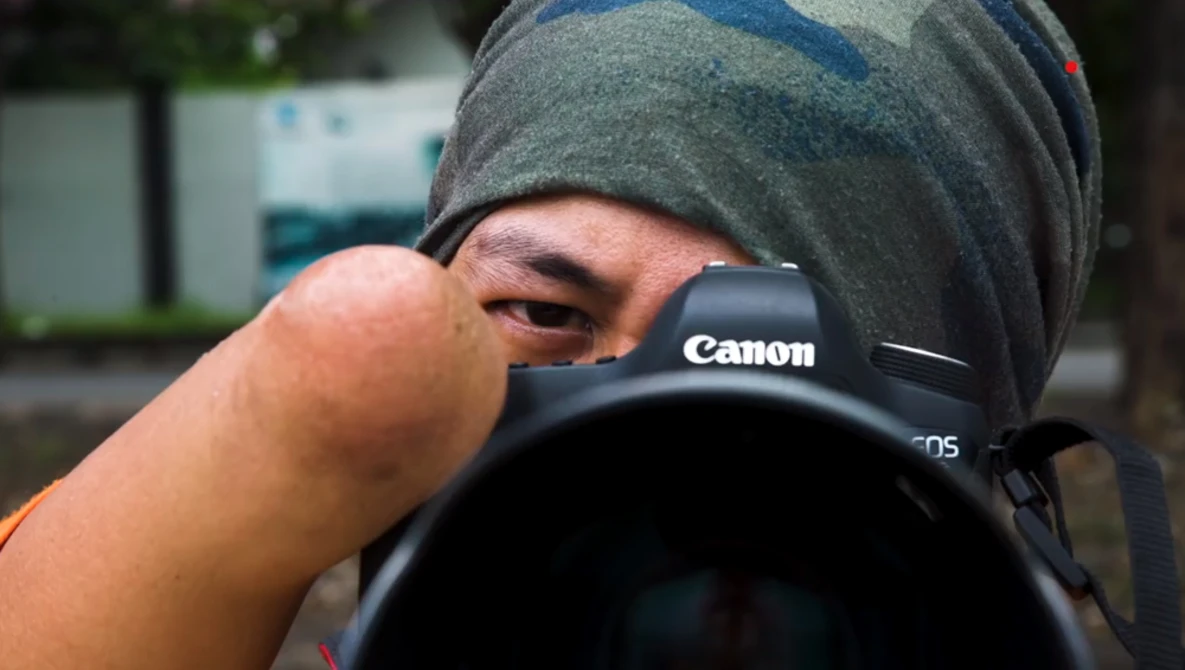 Watch The Photographer Capturing Indonesia With No Hands or Legs on YouTube.