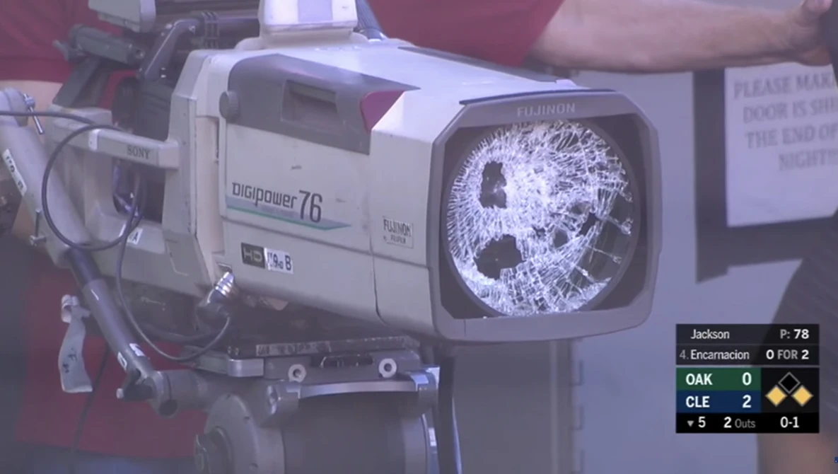 Watch Encarnacion's foul ball breaks a camera lens on YouTube.