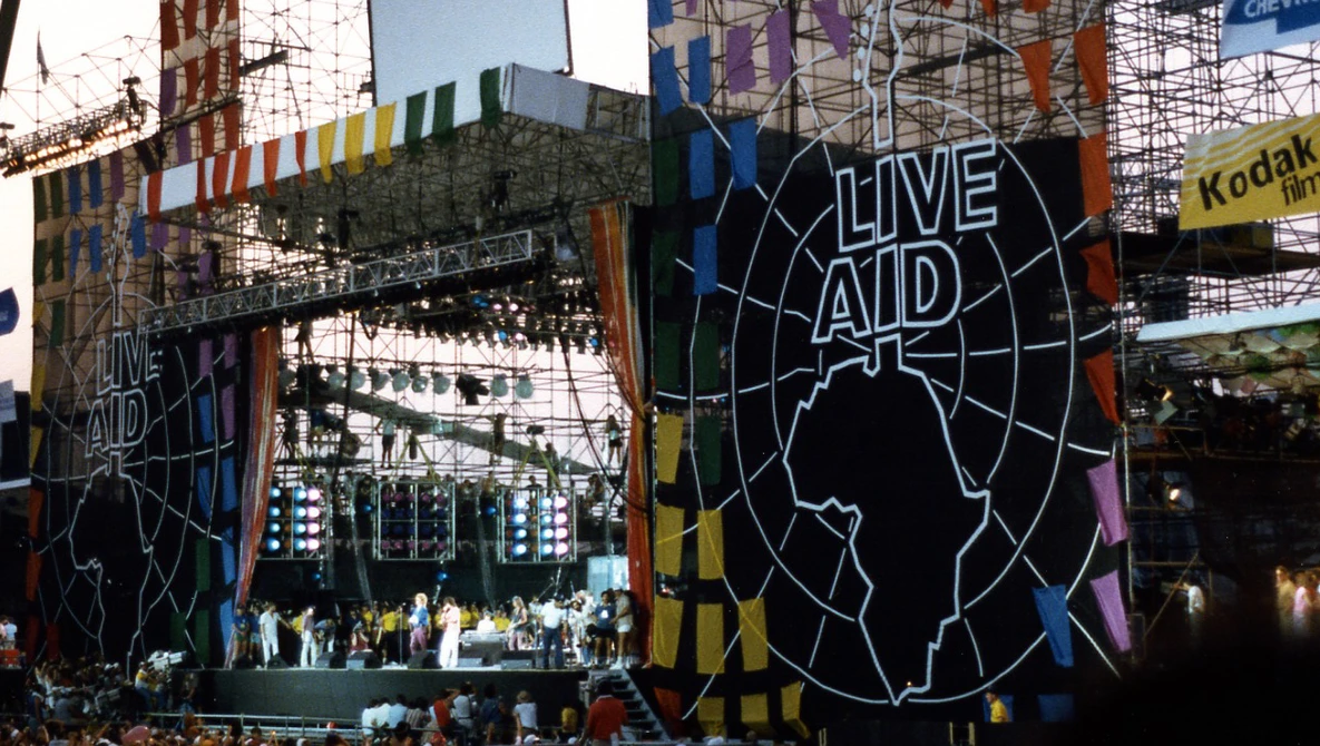 Watch Bohemian Rhapsody | Live Aid Side by Side: "We Will Rock You"  | 20th Century FOX on YouTube.