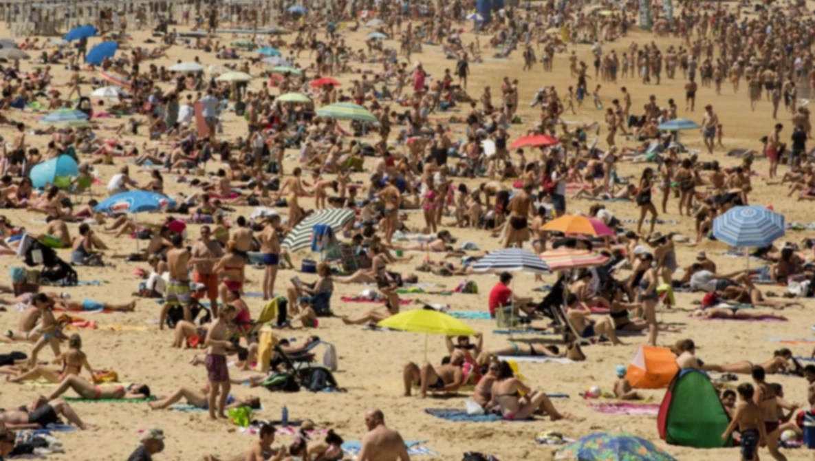 Watch OC Register's picture of large crowds at Newport Beach causes controversy on YouTube.