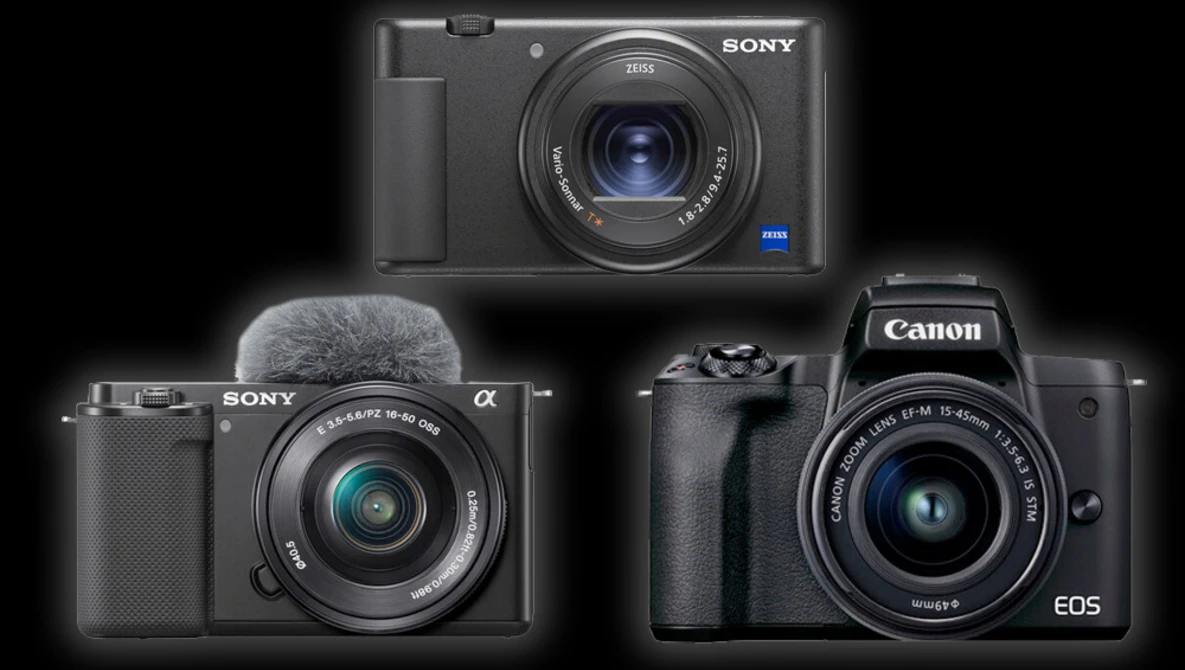 Three digital cameras displayed against a black background: a Sony compact camera at top, a Sony mirrorless camera with microphone at bottom left, and a Canon EOS mirrorless camera at bottom right.
