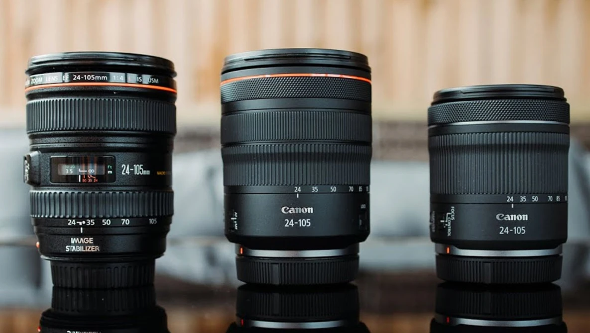 Three Canon zoom lenses arranged in a row, displaying their focal length ranges and optical construction details.