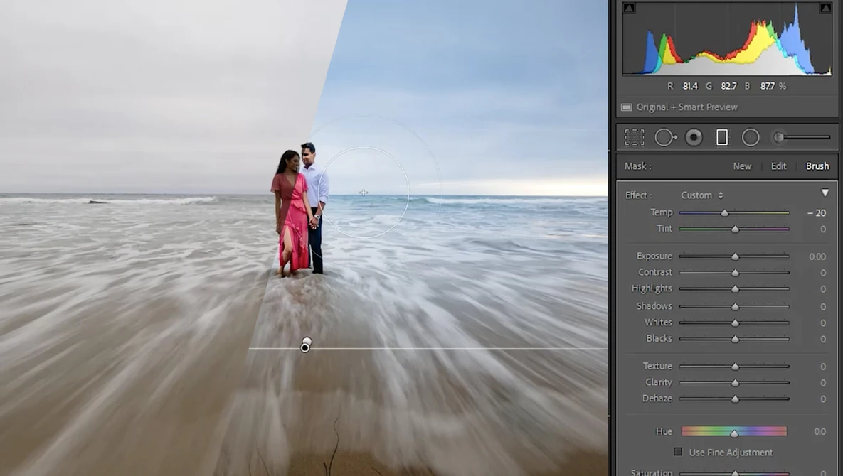 Screenshot of photo editing software showing a couple in red clothing standing in shallow ocean waves.