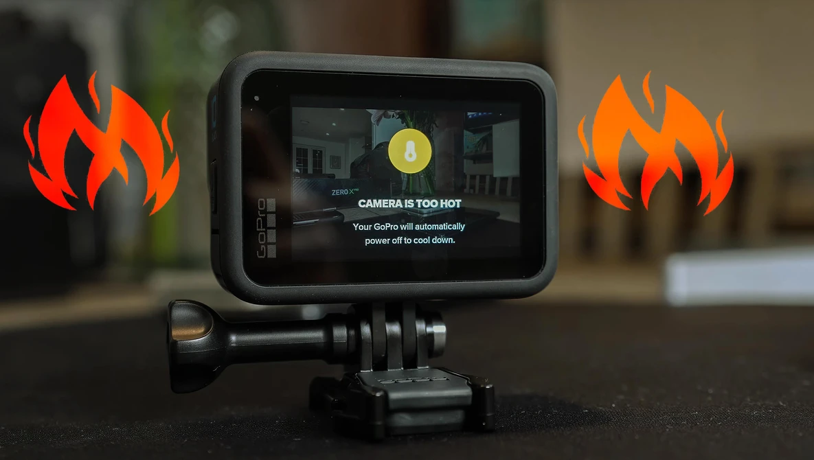 Action camera displaying thermal warning message with animated flame graphics on either side.