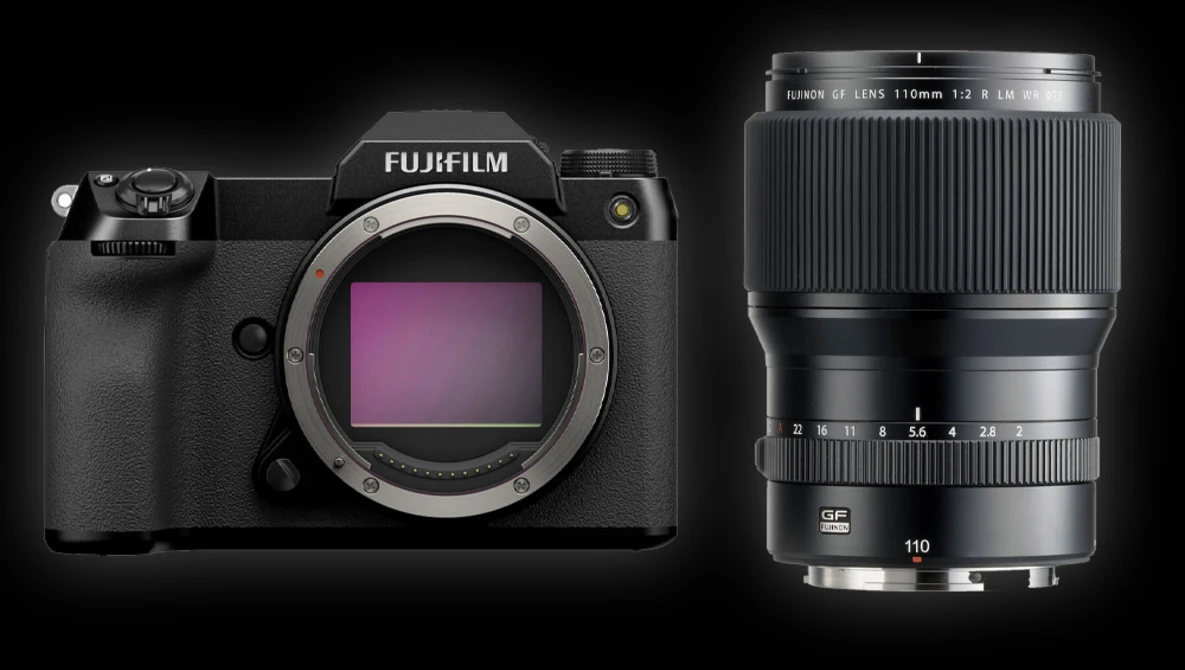 Fujifilm GFX 100S medium format camera body with Fujinon 110mm f/2 lens against black background.