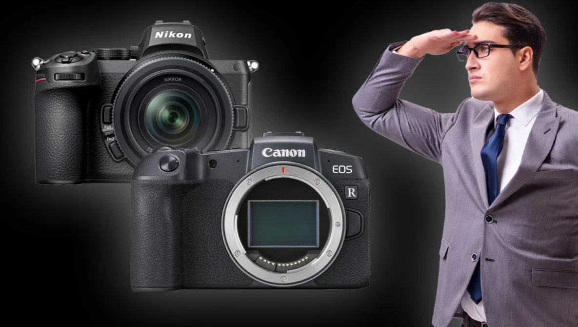 Nikon Z9 and Canon EOS R mirrorless cameras displayed with a man in business attire.