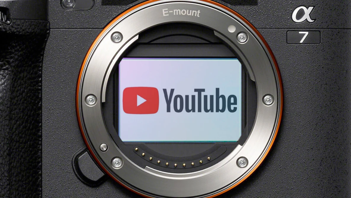 Sony E-mount camera body with YouTube logo displayed on the sensor.