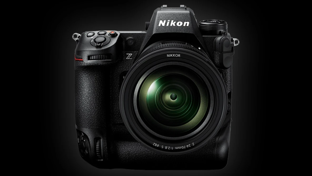 Nikon Z mirrorless camera with attached zoom lens against dark background.