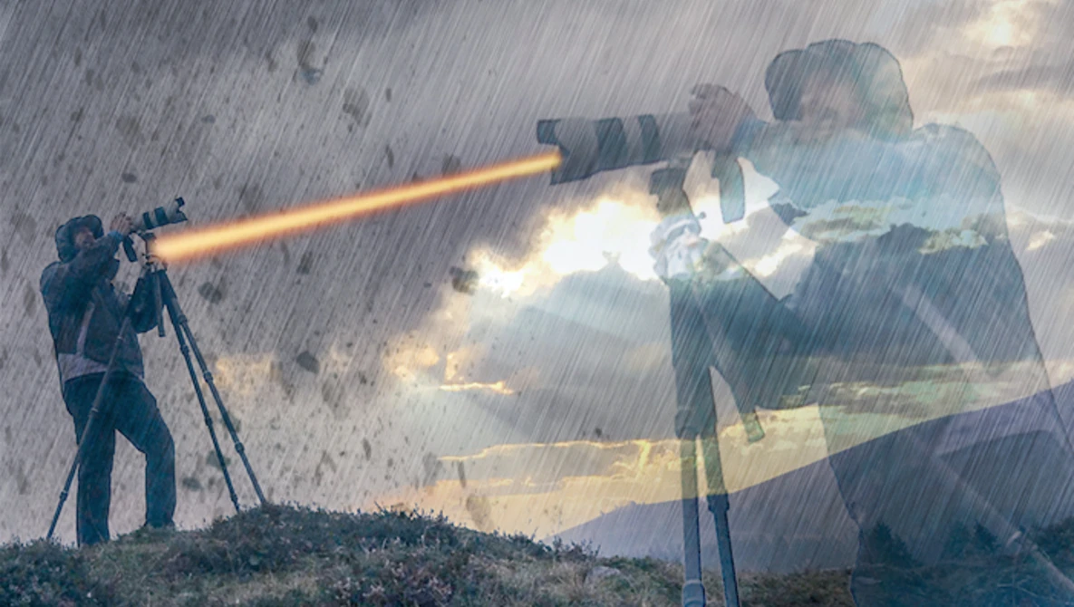 Photographer with telephoto lens on tripod firing a beam of light toward a translucent overlay of a businessman and building.