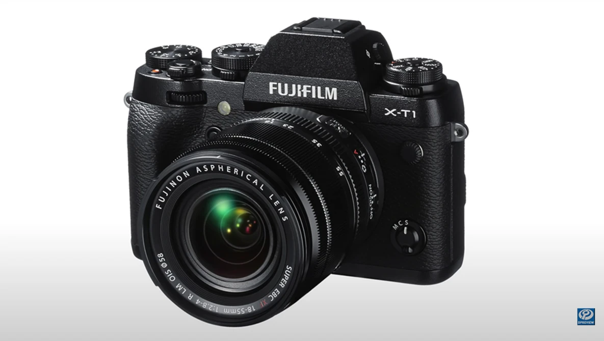 Fujifilm X-T1 mirrorless camera with attached Fujinon lens against white background.
