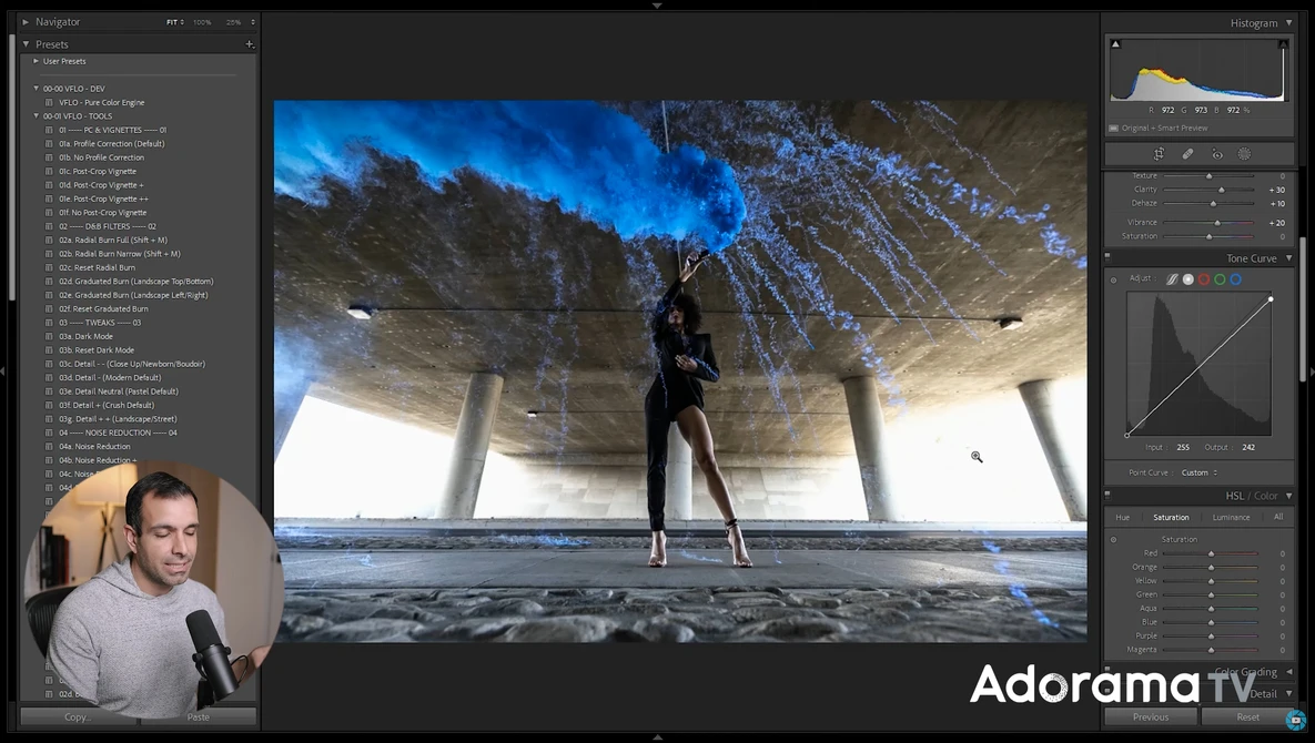 Screenshot of photo editing software showing a composite image of a person standing under a pier with an overlaid sky and water reflection.