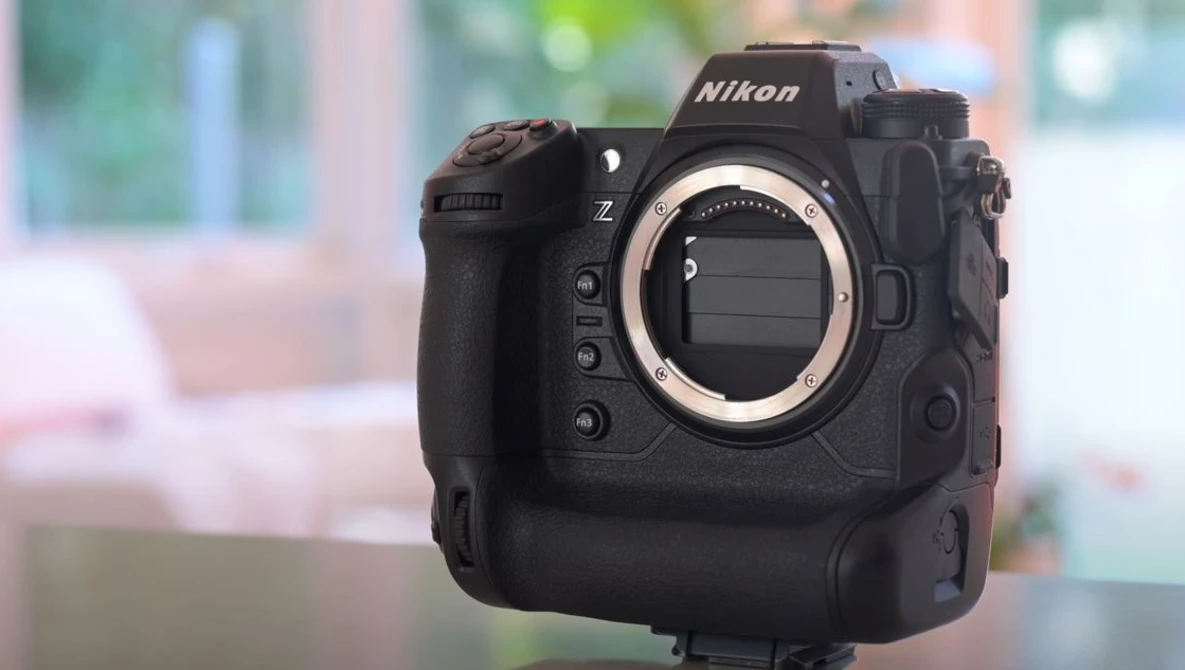 Nikon Z9 mirrorless camera body displayed against a blurred interior background.