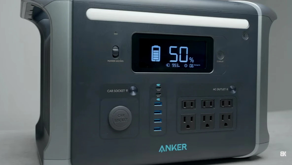 Anker portable power station with display showing 50% battery charge and multiple AC/DC outlets.