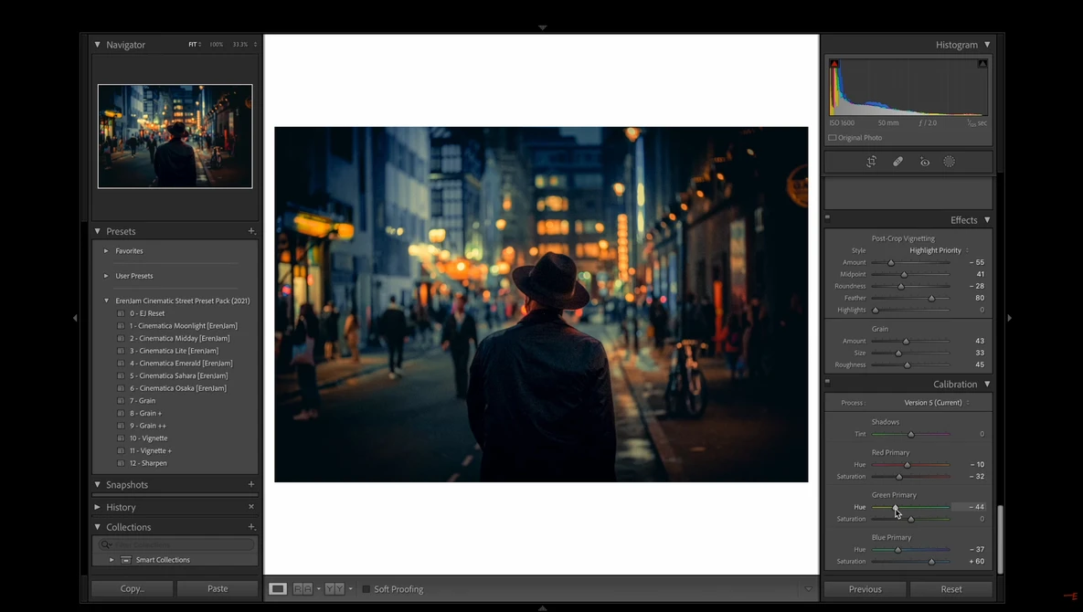 Screenshot of photo editing software showing a nighttime street scene with warm city lights and a lone figure.