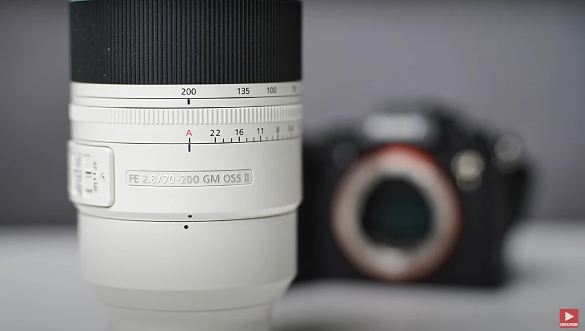 Sony FE 2.8/70-200 GM OSS II telephoto lens with focus ring and distance scale visible.