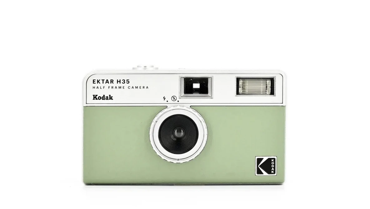 Kodak Ektar H35 half-frame film camera in sage green with chrome accents and viewfinder ports.