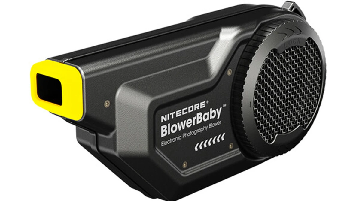 Nitecore BlowerBaby electronic photography blower with yellow accents and mesh grille.