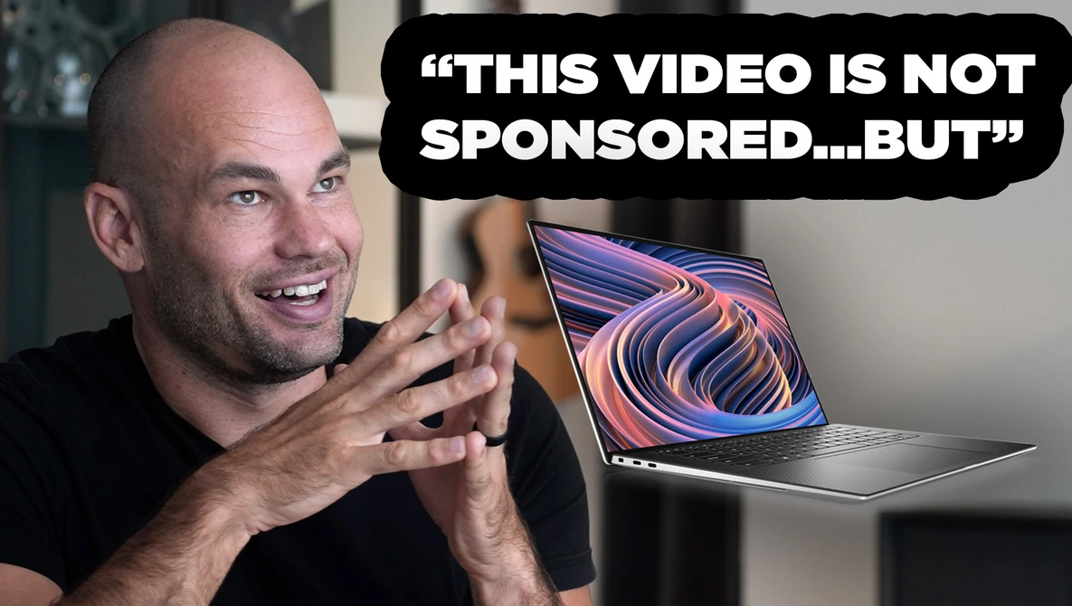 Man speaking to camera next to laptop displaying colorful abstract design, with speech bubble text about video sponsorship.