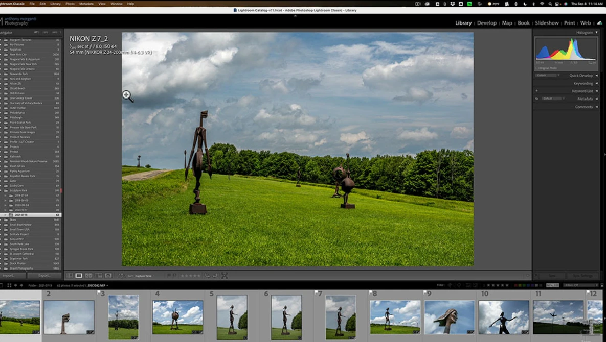 Lightroom Classic interface displaying landscape photo of person with bicycle in green field under cloudy sky.