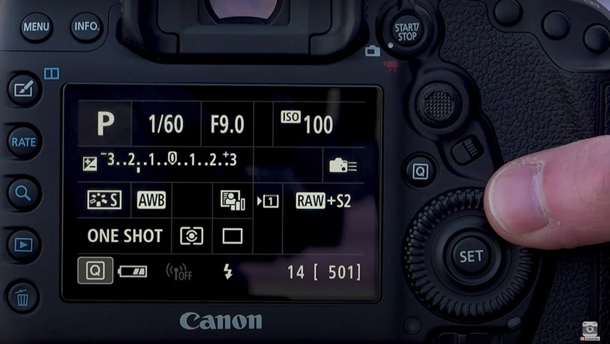 Screenshot of Canon camera LCD screen displaying exposure settings including aperture F9.0, shutter speed 1/60, ISO 100, and RAW+S2 format.