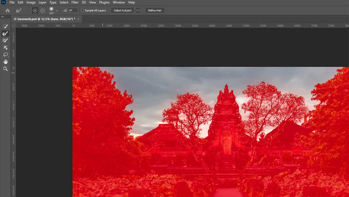 Screenshot showing thermal or infrared image of a temple structure surrounded by trees in red monochromatic tones.
