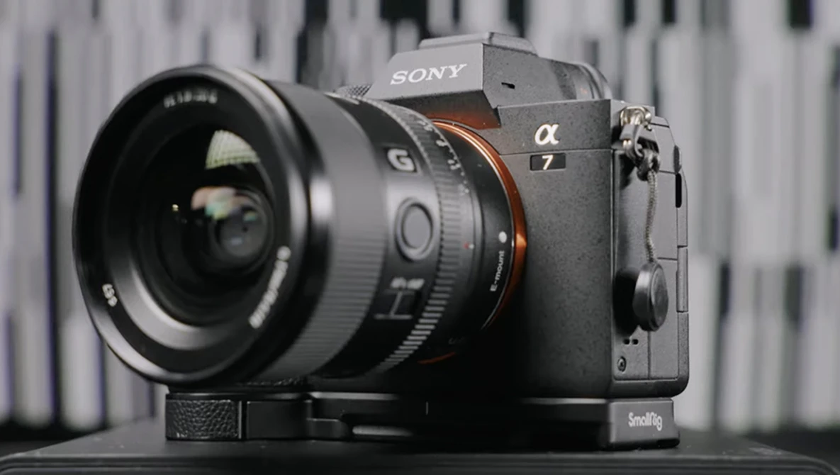Sony a7 mirrorless camera with wide-angle lens mounted on a tripod plate.