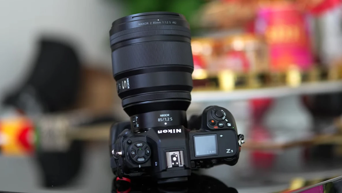 Nikon Z9 mirrorless camera with Nikon Z-mount lens mounted on top.