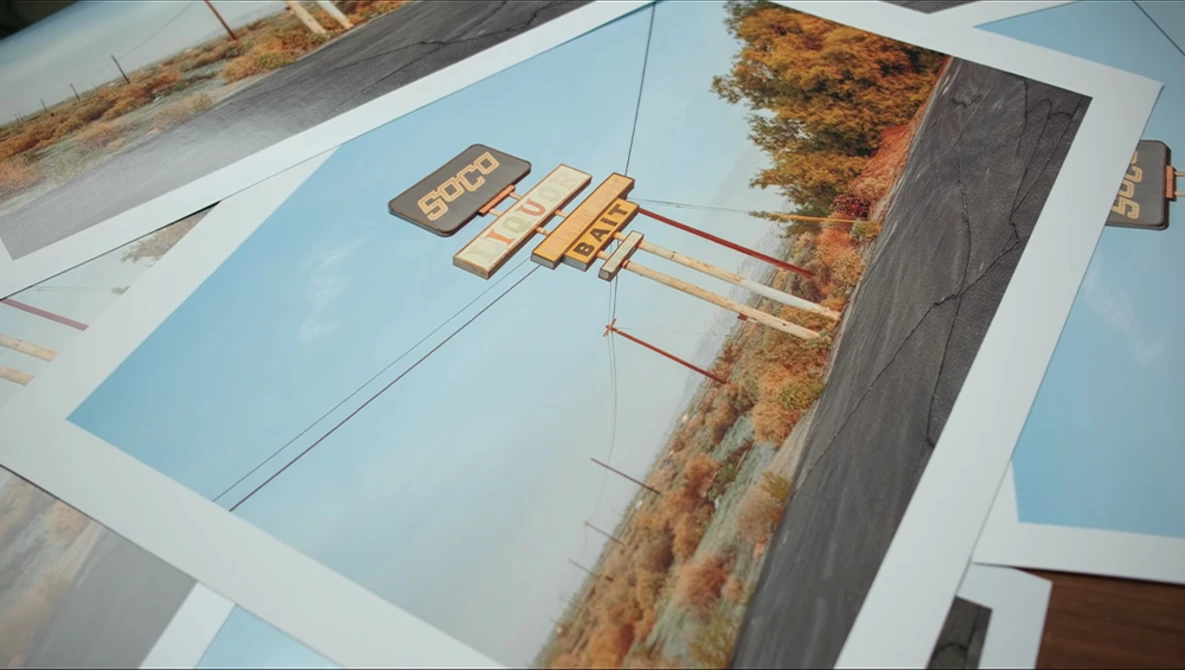 Architectural or landscape design mockup displayed on blue presentation boards with printed photographs and diagrams.