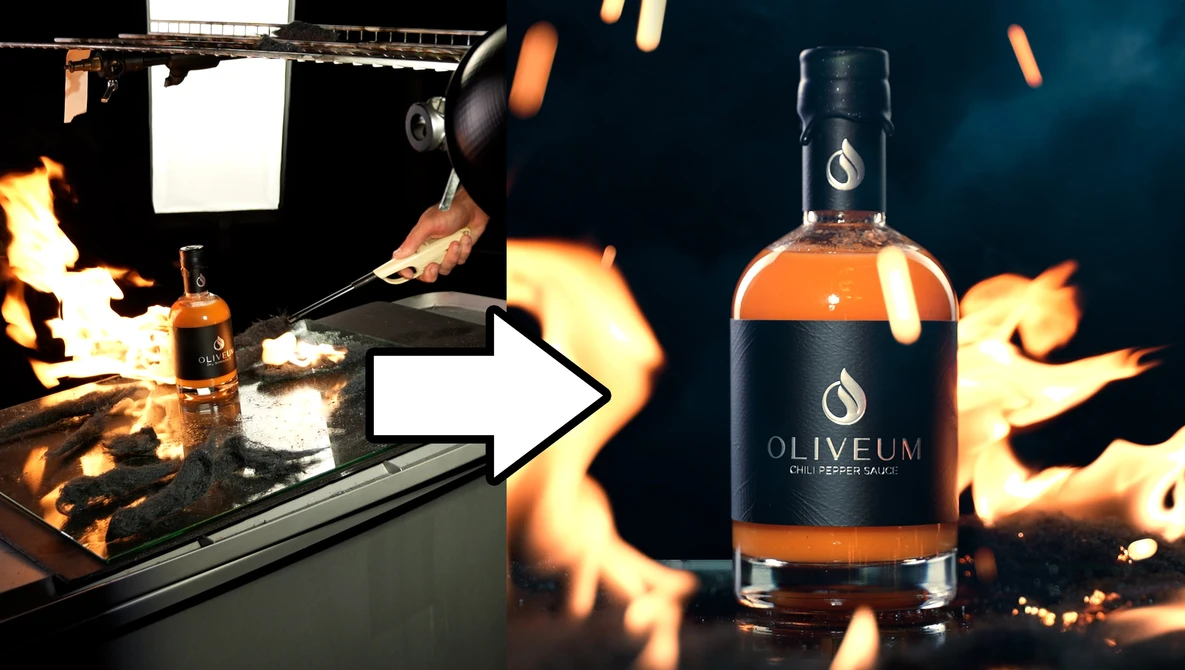 Bottle of Oliveum spirits positioned next to a dramatic studio lighting setup with flames and professional equipment.