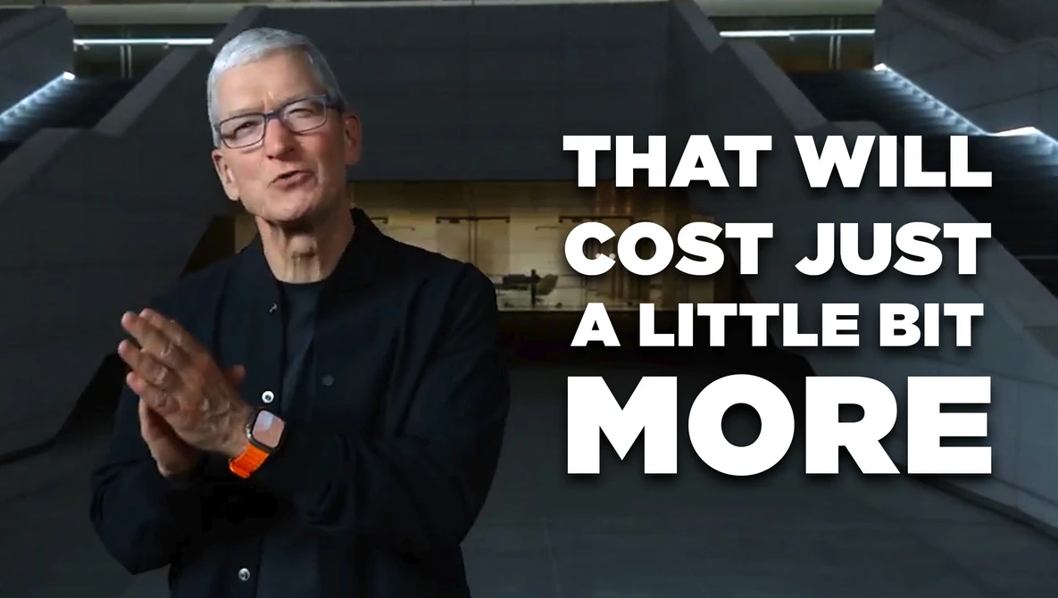 Man in dark jacket and glasses gesturing while speaking, with white text overlay reading "THAT WILL COST JUST A LITTLE BIT MORE."