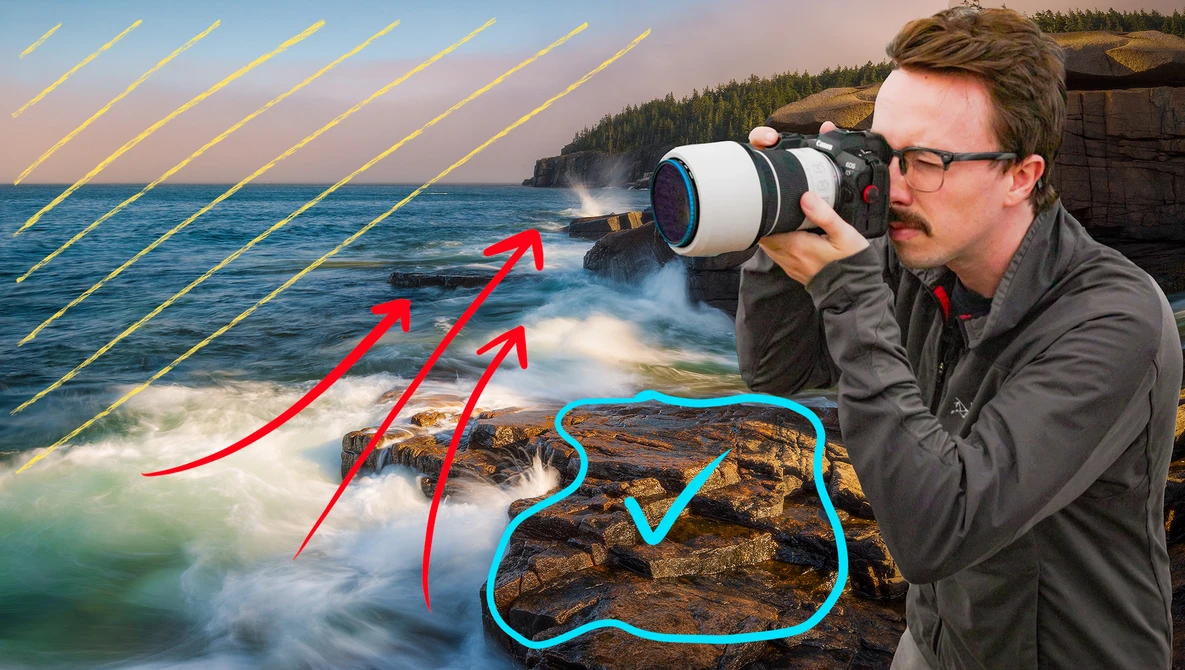 Photographer using a telephoto lens to capture coastal waves crashing against rocky outcrops during golden hour.