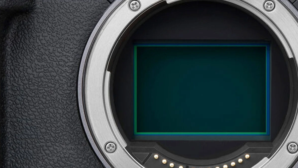 Camera sensor with green and blue rectangular overlay on dark background.
