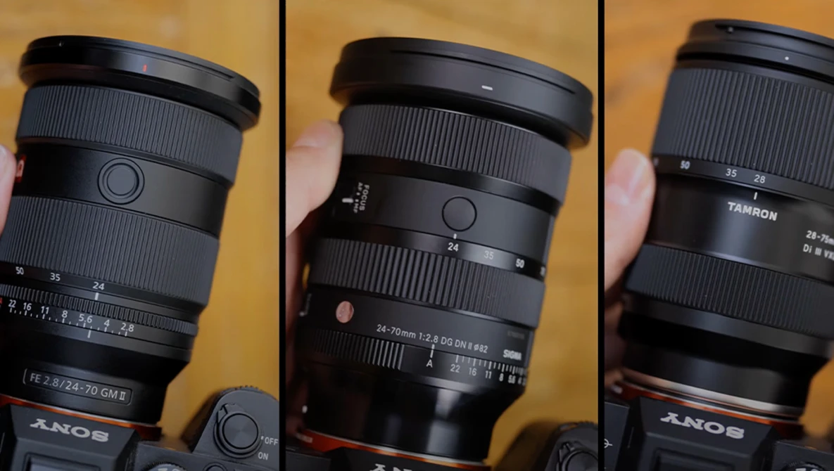 Three Sony camera lenses displayed side-by-side against a wooden background, showing barrel details and focal length markings.
