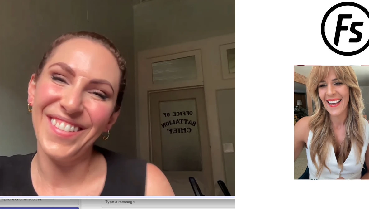 Woman smiling at camera during a video call, wearing black sleeveless top with gold hoop earrings.