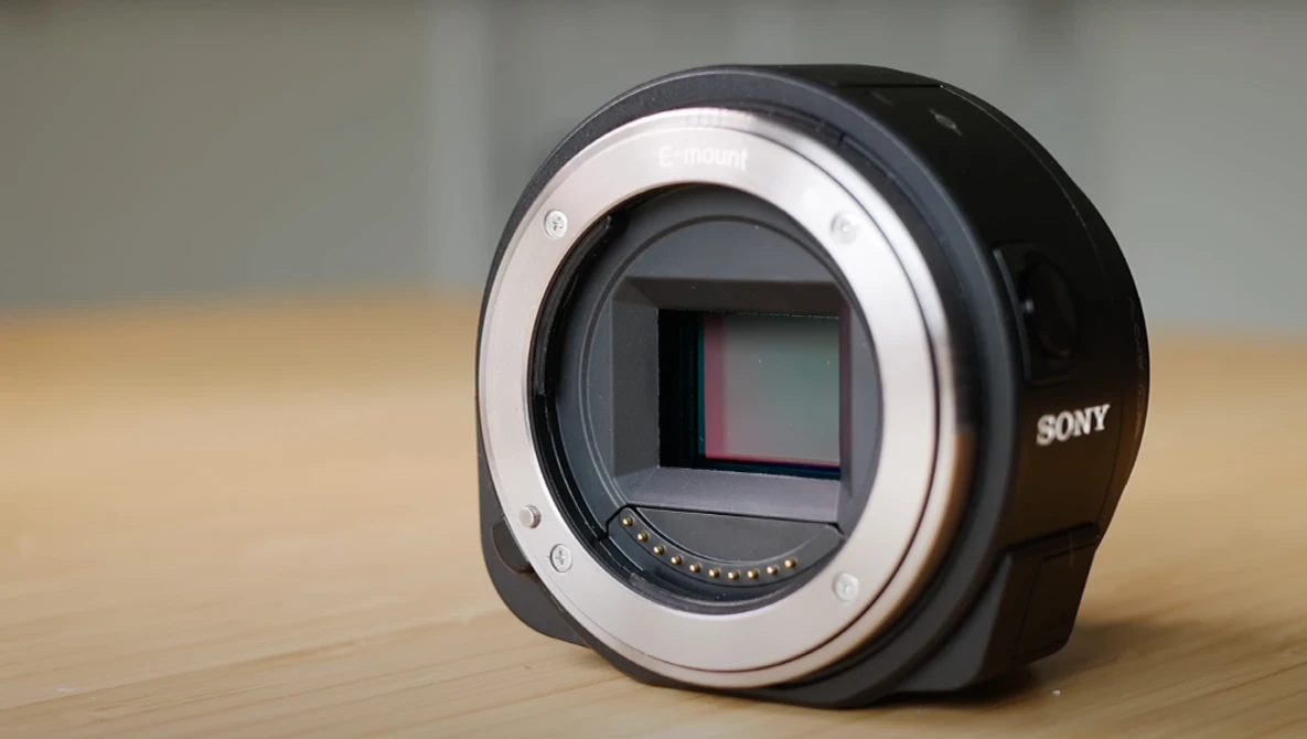 Sony mirrorless camera body with open mount showing sensor and mirror mechanism.