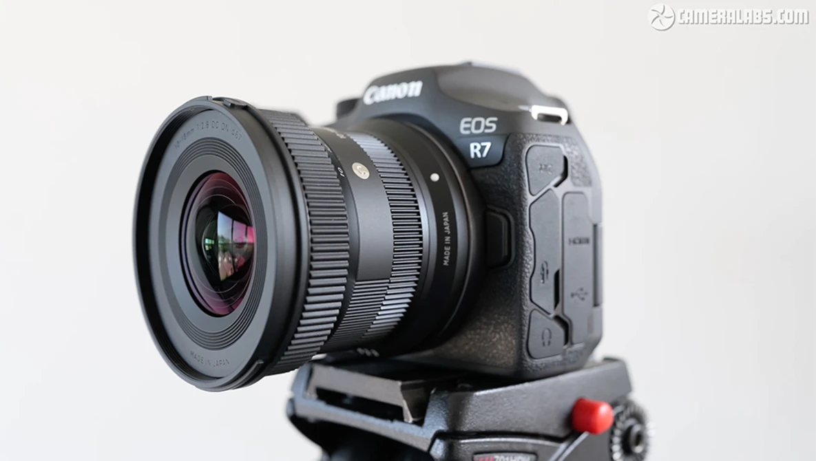 Canon EOS R7 mirrorless camera with Sigma 16mm f/2.8 lens mounted on a tripod head.